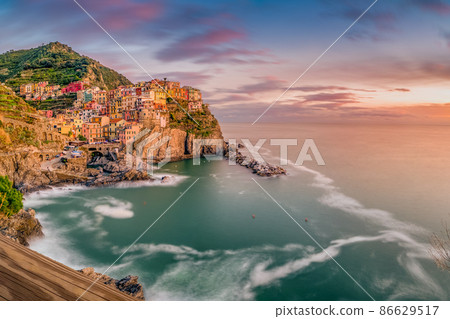 Manarola village at sunset, Cinque Terre National Park, Italy. 86629517