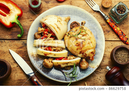 Tasty grilled squid with mushrooms filling Tasty grilled squid with mushrooms filling 86629758