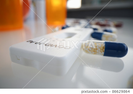 Express test for covid 19 antigen lying among many medical capsules closeup Express test for covid 19 antigen lying among many medical capsules closeup 86629864