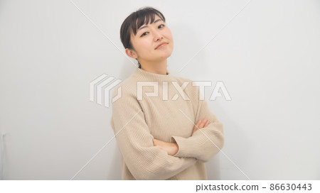A bullish woman with a proud face 86630443