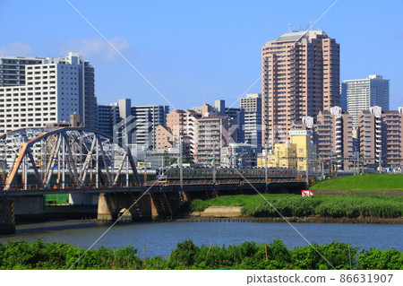 Keisei Line 3500 series renewal car crossing the Arakawa Flood Bypass Keisei Line 3500 series renewal car crossing the Arakawa Flood Bypass 86631907
