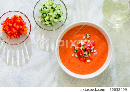 Traditional spanish cold tomato soup of fresh raw vegetables 86632499