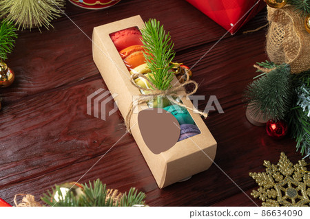 Beautiful colorful set of macarons on Christmas background Beautiful colorful set of macarons on Christmas background 86634090