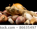 Whole group pile ingredient of fresh onion garlic ginger group  isolated on black background 86635497
