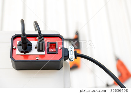 Red trailer plug 2 sockets with on-off switch for use with hand tools. 86636498