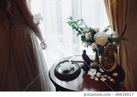 Sensuality blondie bride sitting on chair in Sensuality blondie bride sitting on chair in 86638017