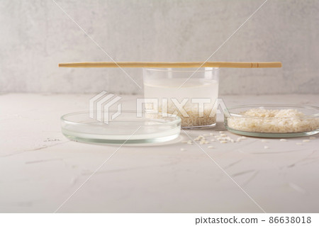 Jar of rice water for skin care face cleansing cosmetic product. Holistic beauty concept, fermented beauty care trend 86638018