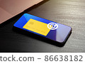 Cashback customer loyalty reward program concept. Money refund service. Smartphone with discount card with rewarding marketing points on the screen 86638182