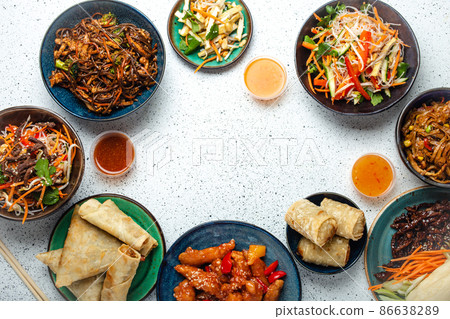 Set of Chinese dishes on white table copy space Set of Chinese dishes on white table copy space 86638289