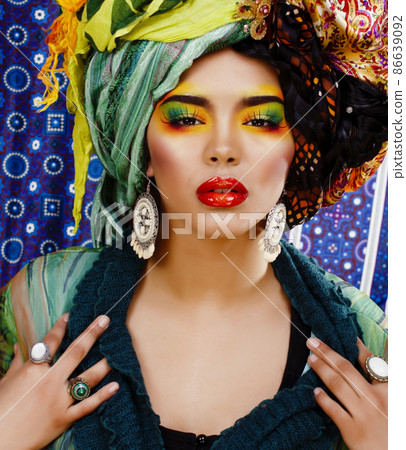 beauty bright african woman with creative make up, shawl on head like cuban woman 86639092
