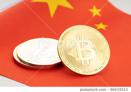 Bitcoin cryptocurrency coins on national flag of China. Crypto law regulation concept Bitcoin cryptocurrency coins on national flag of China. Crypto law regulation concept 86639323