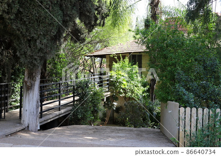 footbridge in a city park in northern Israel. 86640734