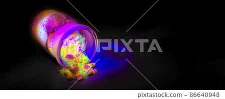 Fluorescent organic materials of red, yellow and green color for production OLED inside glass bottle in UV light. 86640948
