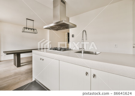 Stunning design of the kitchen in a minimalist style in gray tones 86641624