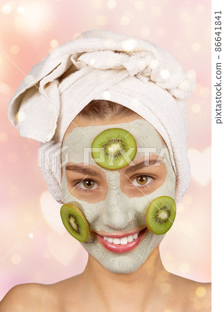 Beautiful young woman enjoy spa salon. 86641841