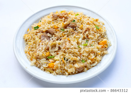 Fried rice in white plate on white background. Fried rice in white plate on white background. 86643312