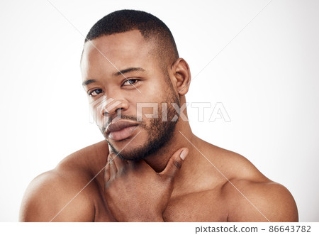 Be the best-looking, most well-groomed man in the room. Studio portrait of a handsome young man posing against a white background. 86643782