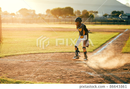 You cant beat someone who never gives up. Shot of a baseball player running during a match. 86643861