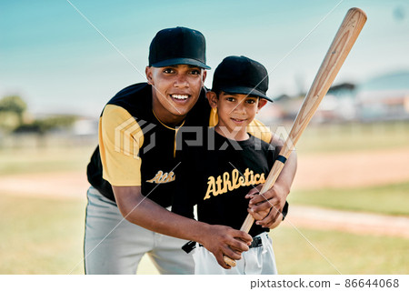 All the practice will soon pay off. Shot of two baseball players standing together on the pitch. All the practice will soon pay off. Shot of two baseball players standing together on the pitch. 86644068