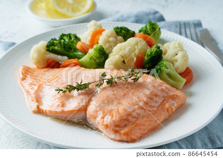 Steam salmon and vegetables, Paleo, keto, fodmap, dash diet. Mediterranean food with fish 86645454