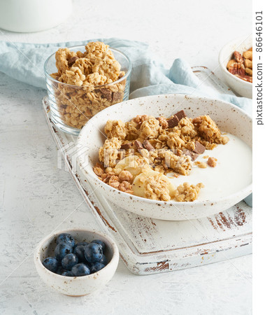 Granola. Breakfast, healthy diet food with oat flakes Granola. Breakfast, healthy diet food with oat flakes 86646101