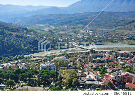 Overlooking the cityscape of Berat's new city in the Osumi River basin from Fort Berat, Albania Overlooking the cityscape of Berat's new city in the Osumi River basin from Fort Berat, Albania 86646811