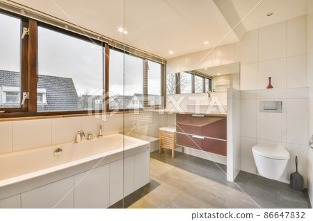 Luxury interior design of a bathroom with marble walls Luxury interior design of a bathroom with marble walls 86647832
