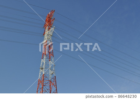 Steel tower in the blue sky 86648230