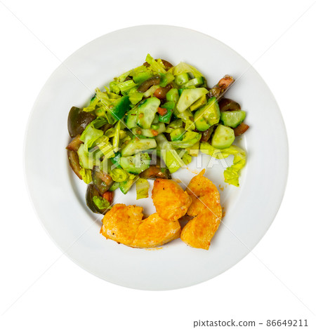 Chicken breast with salad is served on plate Chicken breast with salad is served on plate 86649211