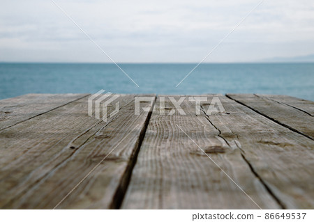 Blue beach and wooden table. abstract background 86649537