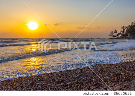 Beautiful sea waves in the morning sunrise. 86650631