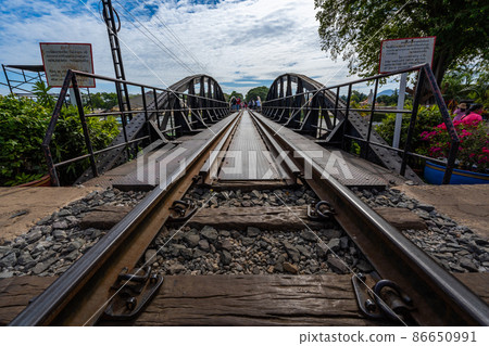 Railway on a Bridge over the River Kwai, Kanchanaburi, Thailand. 86650991