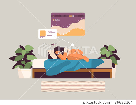 woman sleeping in bed with electronic smart watch app tracker on hand quality and quantity sleep control 86652164