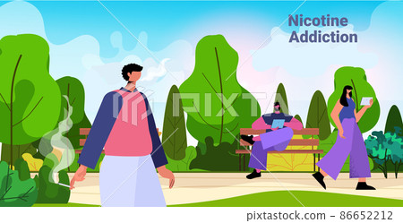 man smoking cigarette in park bad habits unhealthy lifestyle nicotine addiction concept 86652212