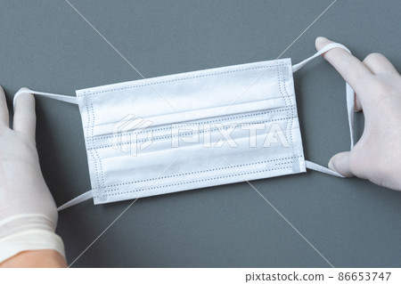 mask and corona virus protection isolated on a gray background 86653747