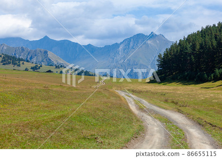 View in Mountains. Road to Shenako village from Diklo in Tusheti region 86655115