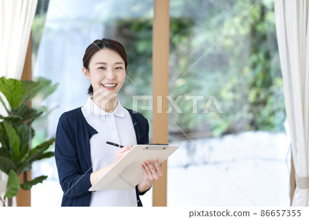 Young female caregiver Young female caregiver 86657355