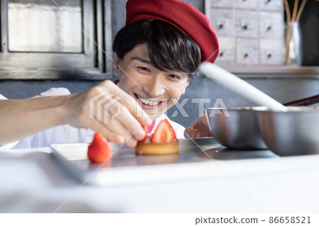 Pastry chef making sweets Pastry chef making sweets 86658521