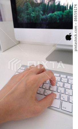 Hand hitting the keyboard Hand hitting the keyboard 86659174