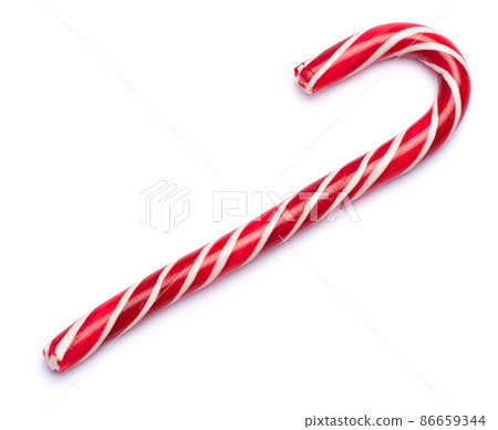 Christmas and New Year concept - sweet Christmas caramel stick isolated on white background 86659344