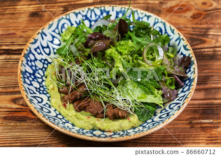 salad mix with avocado and cucumber, with balsamic dressing salad mix with avocado and cucumber, with balsamic dressing 86660712