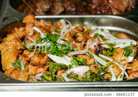 Fried grilled pork chops with caramelized onions Fried grilled pork chops with caramelized onions 86661237
