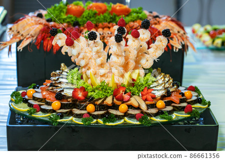 variety of seafood on a plate ready to eat variety of seafood on a plate ready to eat 86661356