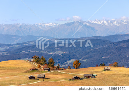 Tourist scenic paths on Seiser Alm plateau during golden autumn. South Tyrol, Italy. Tourist scenic paths on Seiser Alm plateau during golden autumn. South Tyrol, Italy. 86661651