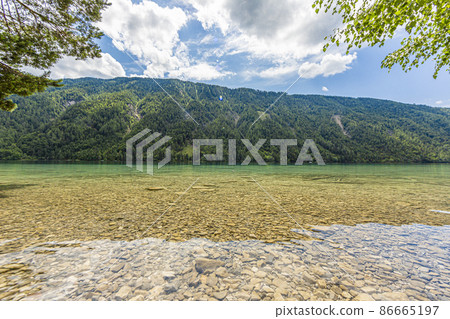 Picture of pretty Weissensee lake in Austria in summer Picture of pretty Weissensee lake in Austria in summer 86665197