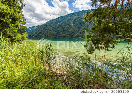 Picture of pretty Weissensee lake in Austria in summer Picture of pretty Weissensee lake in Austria in summer 86665199