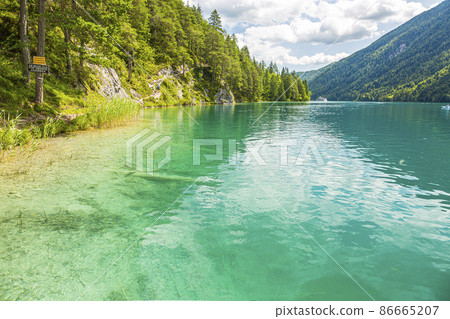 Picture of pretty Weissensee lake in Austria in summer Picture of pretty Weissensee lake in Austria in summer 86665207