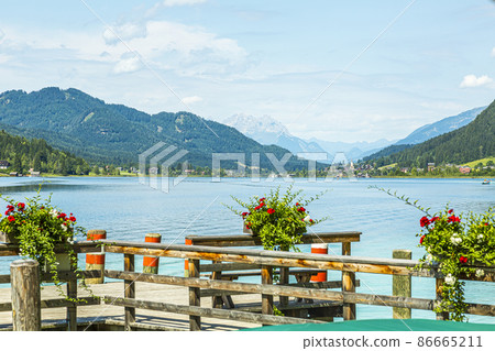 Picture of pretty Weissensee lake in Austria in summer Picture of pretty Weissensee lake in Austria in summer 86665211
