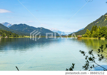 Picture of pretty Weissensee lake in Austria in summer Picture of pretty Weissensee lake in Austria in summer 86665212