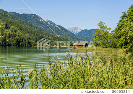 Picture of pretty Weissensee lake in Austria in summer Picture of pretty Weissensee lake in Austria in summer 86665214